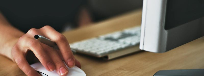 Person Holding Apple Magic Mouse