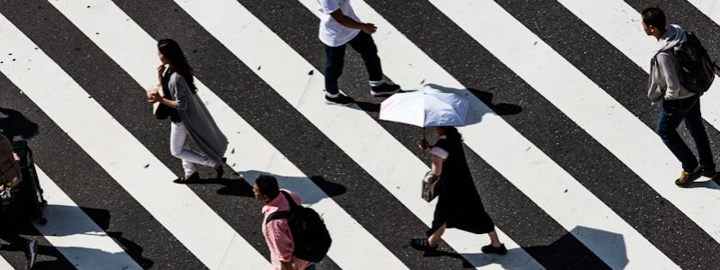 peoples walking on pedestrian lane