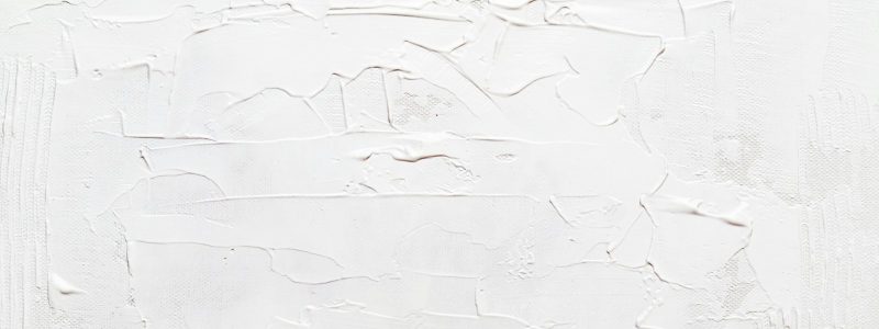 a white wall with some white paint on it